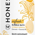 Honest Company bubble bath bottle with citrus vanilla design