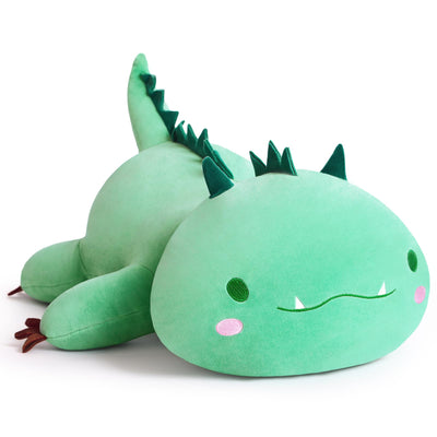 Green plush dragon toy on a white background