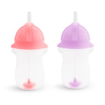 Two sippy cups with pink and purple lids on a white background