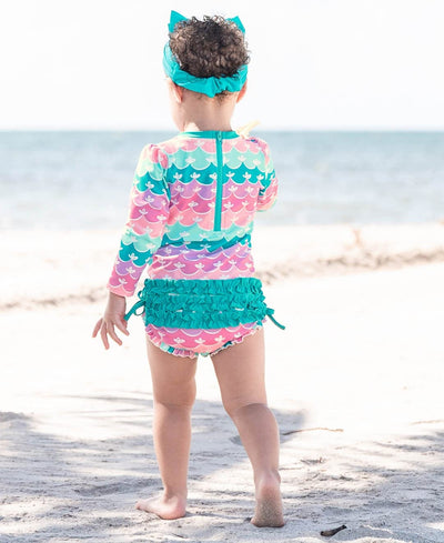 RuffleButts Baby Girls UPF 50+ Sun Protection Novelty Print Long Sleeve One Piece Rash Guard Swimsuit with Zipper - Mermaid/Aqua, 6-12m