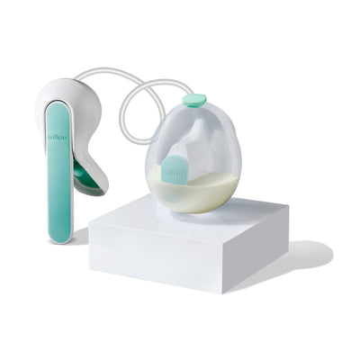 Breast pump with a clear container on a white background