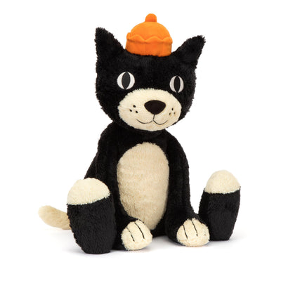 Black and white plush toy with an orange hat on a white background