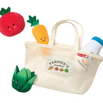 Toy vegetable set with a mesh bag labeled 'Farmer's Market' on a white background