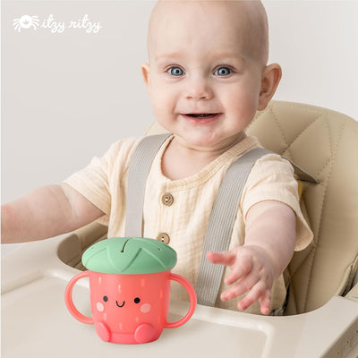 Itzy Ritzy Toddler Snack Cup - Spill-Proof Snack Cup for Toddlers with Soft Silicone Lid for Easy Food Access - Easy-To-Hold Kids Snack Container With Handles - Ideal for 12 months & Up (Strawberry)