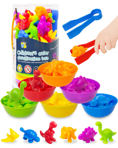 Colorful children's toy set with sorting bowls and toys, including a hand using tongs.
