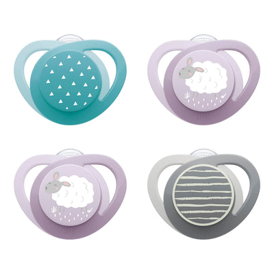 Four baby pacifiers with different designs on a white background