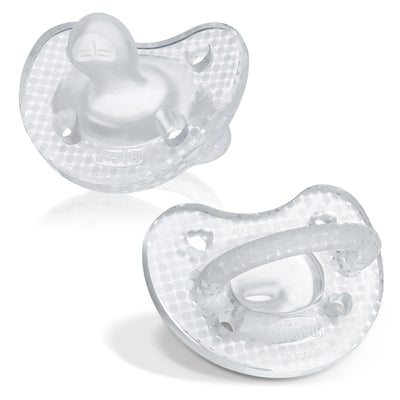 Two clear baby pacifiers on a white background