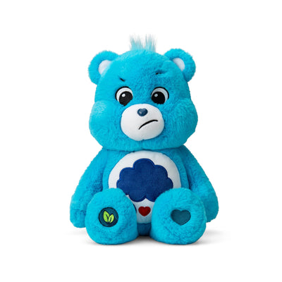 Blue teddy bear with a white belly featuring a blue cloud and red heart on a white background