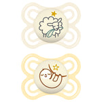 Two baby pacifiers with cartoon designs on a white background