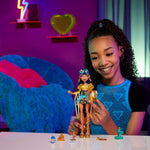 Monster High Cleo De Nile Doll in Golden Blouse & Layered Skirt, Includes Pet Cobra Hissette & Accessories Like a Backpack, Snack & Scroll