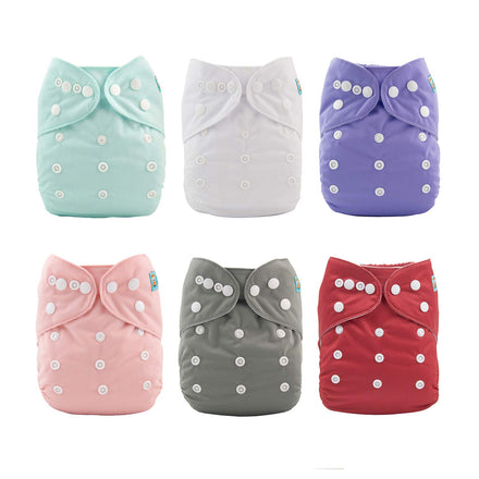 Set of six colorful cloth diapers with button closures on a white background