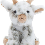 Plush toy goat with white fur and brown horns on a white background