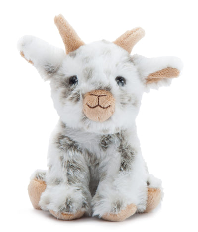 Plush toy goat with white and brown fur on a white background
