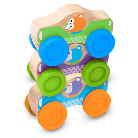 Colorful baby toy with animal faces on a white background
