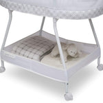 Delta Children Sweet Dreams Bassinet with Airflow Mesh Bedside Portable Crib with Vibration Lights and Music, Grey Infinity