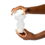 Motif Medical Manual Handheld Breast Pump - Portable Breast Milk Pump for New Mothers - Flexible & Air Powered Suction Silicone Breast Pump - Nursing Essentials for Newborn Babies (4oz, Clear)