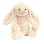 Plush bunny toy on a white background