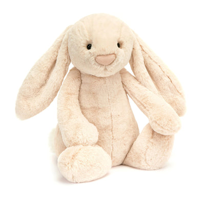 Plush bunny toy on a white background