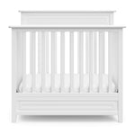 Storkcraft Petal 4-in-1 Convertible Mini Crib (White) – GREENGUARD Gold Certified, Converts to Daybed and Twin-Size Bed, Bonus 2.75-inch Mini Crib Mattress Included, Ideal for Small Spaces