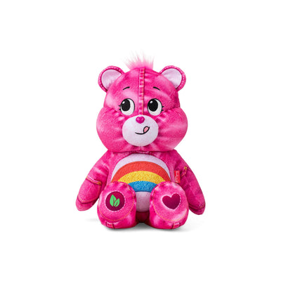 Pink plush toy with a rainbow design on a white background