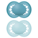Two blue silicone pacifiers on a white background