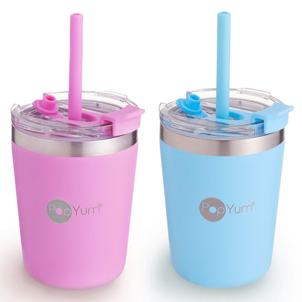 Two stainless steel tumblers, one pink and one blue, with straws on a white background.