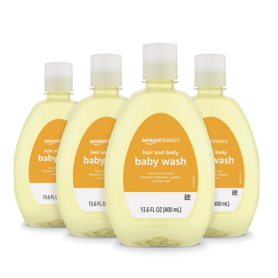 Four bottles of Amazon Basics hair and body baby wash on a white background