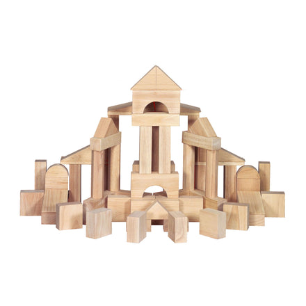Set of wooden building blocks arranged to resemble a small castle on a white background
