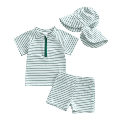 Children's swim set with striped rash guard, shorts, and hat on a white background