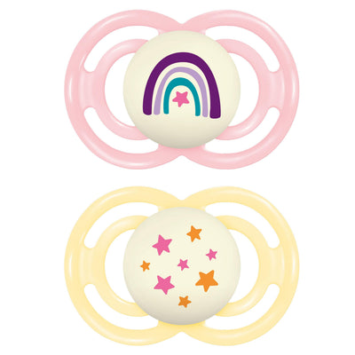 Two baby pacifiers with colorful designs on a white background