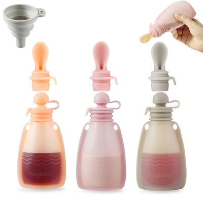 Three silicone bottles with different colored tops and a funnel on a white background.