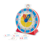 Children's educational clock toy with cards on a white background