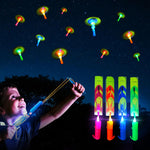 OceanWings LED Flying Set with Whistle, 25 Slingshot+25 Glow Helicopter, Flying Toy Outdoor Toy Glow in The Dark Party Supplies Party Favors Bulk for Kids 8-12,4-8 Outdoor Game Easter Basket Stuffer