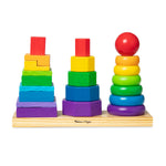 Colorful wooden stacking toys on a white background