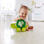 Hape Tito Pull Along | Wooden Turtle with Swirling Shell Pull Toddler Toy, Green
