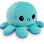Blue plush octopus toy on a white background