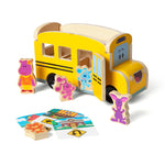 Wooden school bus puzzle with animal figures and road signs on a white background