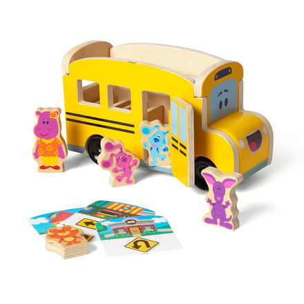 Wooden school bus puzzle with animal figures and road signs on a white background