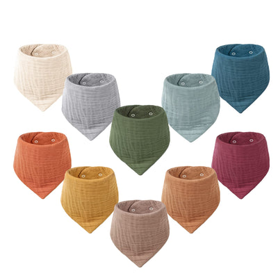 Collection of colorful baby bandannas on a white background