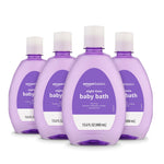 Four bottles of Amazon Basics night time baby bath on a white background