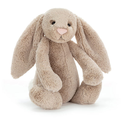 Plush bunny toy on a white background