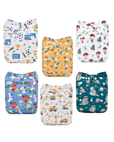 Set of five colorful children's cloth diapers with various patterns on a white background