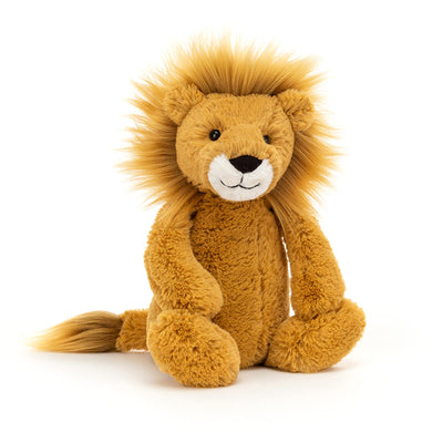 Plush lion toy on a white background