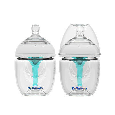 Two Dr. Brown's baby bottles with clear design on a white background