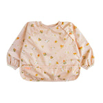 Floral-patterned baby bib on a white background