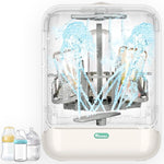 Nuk baby bottle sterilizer with bottles on a white background