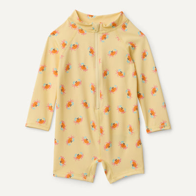 Yellow baby romper with crab pattern on a white background
