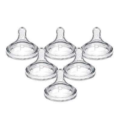 Five clear baby bottle nipples arranged in a circular pattern on a white background.