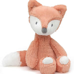 Plush fox toy on a white background
