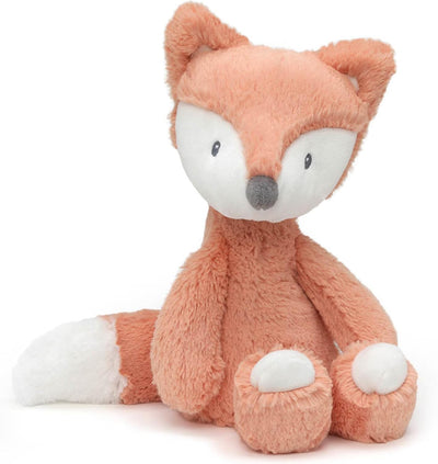 Plush fox toy on a white background